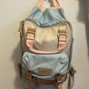 Himawari Backpack Amazon Worn pink blue and cream color